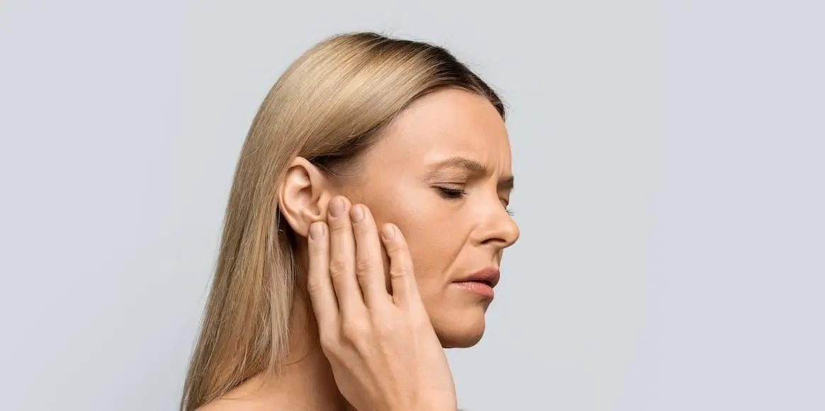 Tinnitus.,Profile,Of,Sick,Female,Middle,Aged,Blonde,Woman,Having